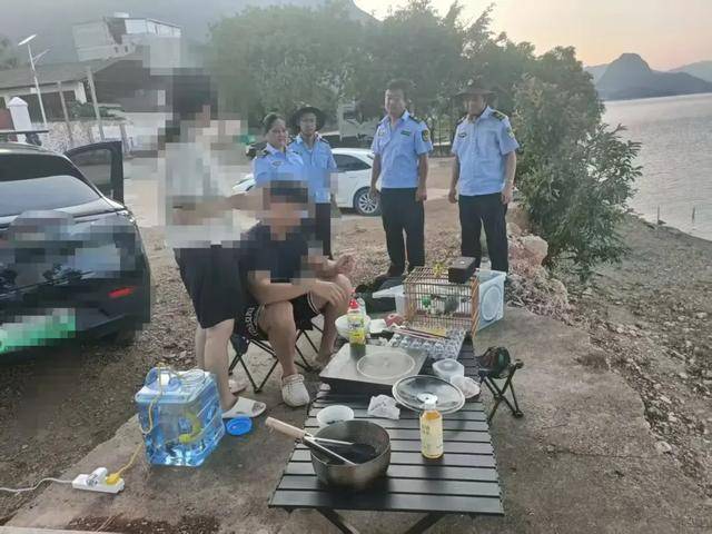玉溪2人在抚仙湖湖滩露营、野炊被处罚
